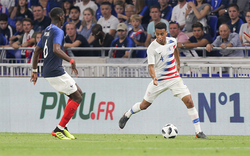 Tyler Adams on the dribble against Paul Pogba during the USA's 1-1 draw with France on June 9, 2018 in Lyon